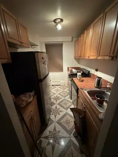 kitchen with wood cabinets and tile floor