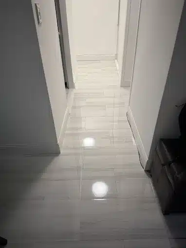 white marble tiled hallway flooring